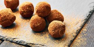 How To Make Chocolate-Covered Almond Butter Balls